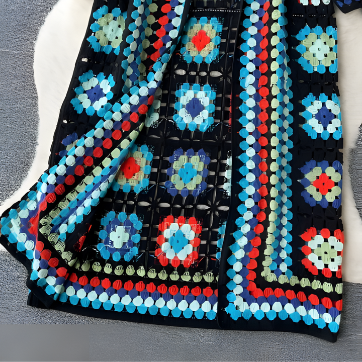 Chique kleurrijk lang damesvest, elegant en veelzijdig, perfect voor diverse outfits. Comfortabele vrouwenkleding.