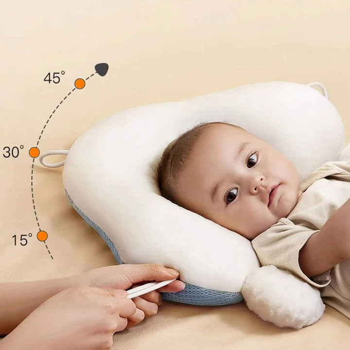 Ergonomisch gevormd slaapkussen voor baby's, ondersteunt hoofd en rug voor veilige slaap (0-12 maanden).
