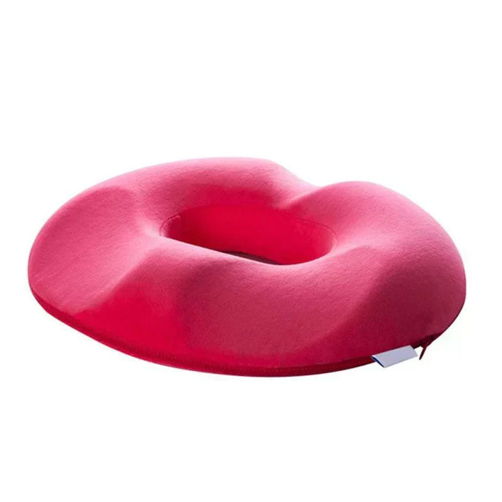 Orthopedisch zitkussen op bureaustoel. Ergonomische zitondersteuning voor aambeien, staartbeen en rugcomfort.