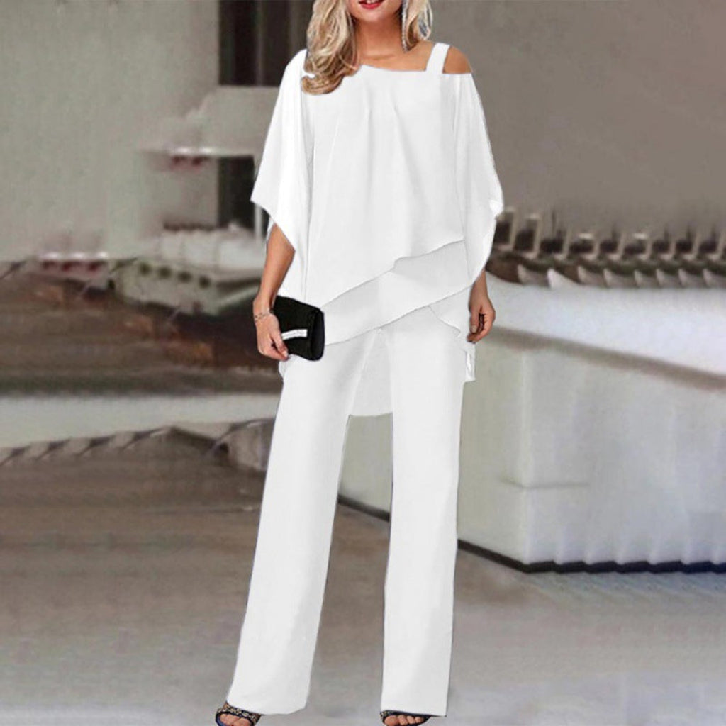 Elegante dames tweedelige set met comfortabele vleermuismouwtop en stijlvolle rechte broek voor een moderne look.