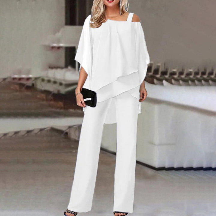 Elegante dames tweedelige set met comfortabele vleermuismouwtop en stijlvolle rechte broek voor een moderne look.
