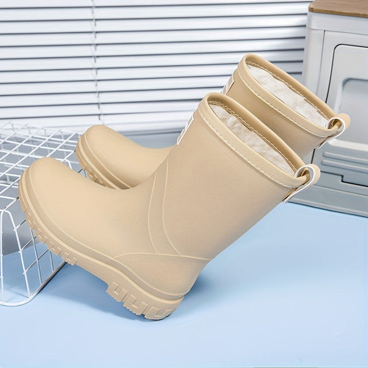 Warme waterdichte dames regenlaarzen met comfortabele fleecevoering en handige slip-on design.