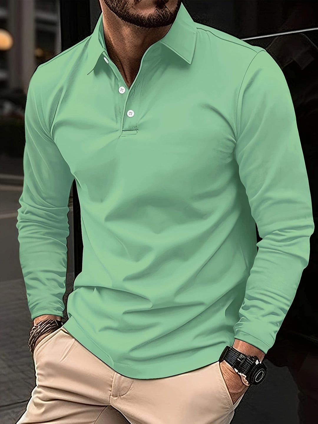 Witte herenpolo met lange mouwen, comfortabel en stijlvol voor casual en elegante looks.