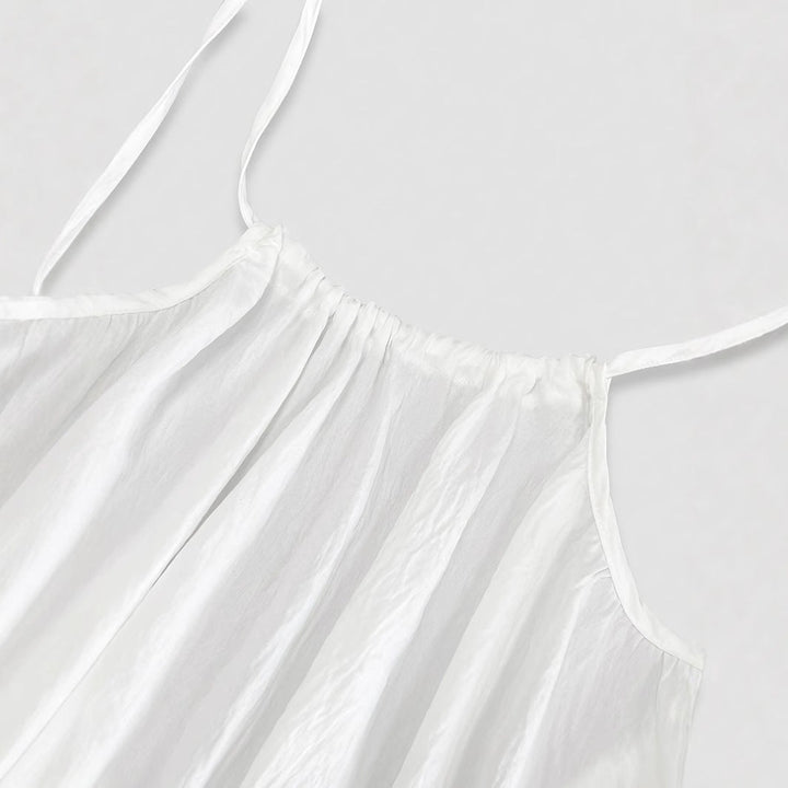 Casual lange jurk met open rug, ideaal voor comfortabele dagen thuis of ontspannen momenten.