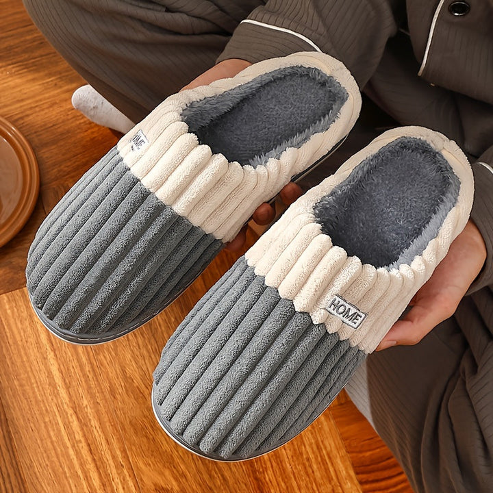 Warme heren sloffen met zachte voering; ideaal voor koude winteravonden thuis.