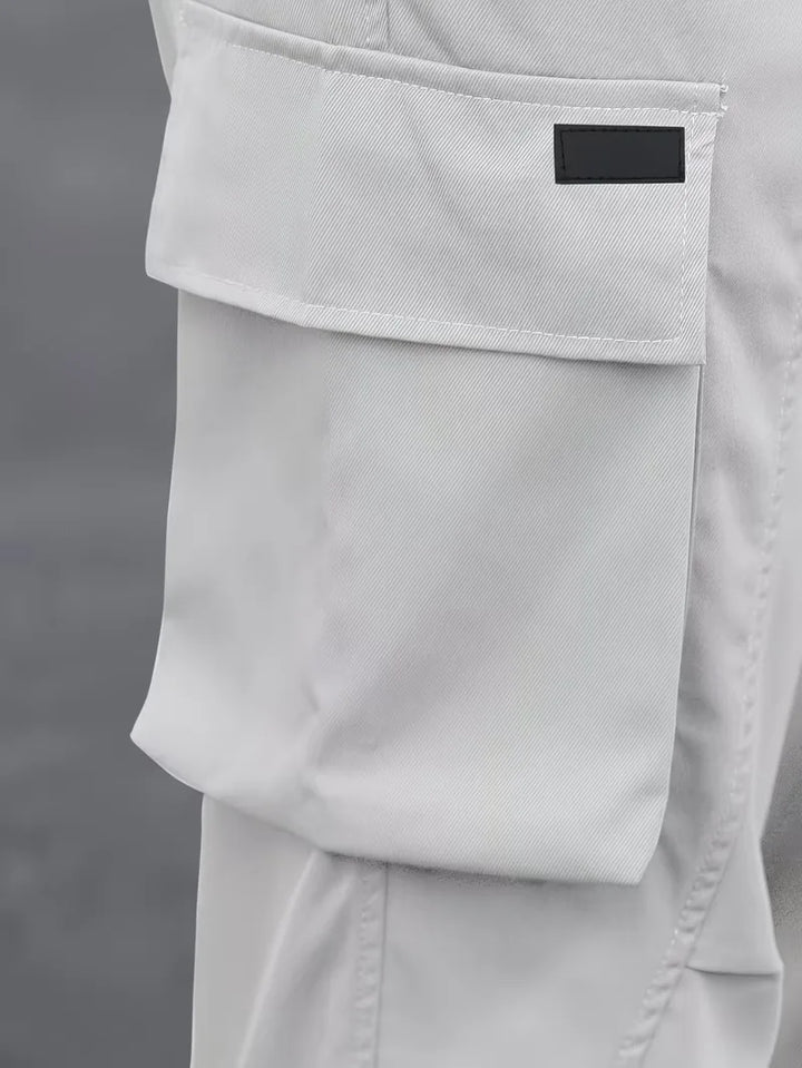 Beige cargo broek voor heren, elastische taille, stijlvol en veelzijdig.