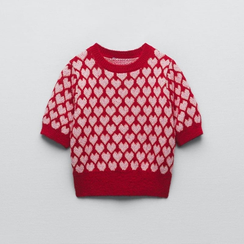 Comfortabele damestrui met korte mouwen en unieke speelse print, ideaal voor casual lente/zomer stijl.