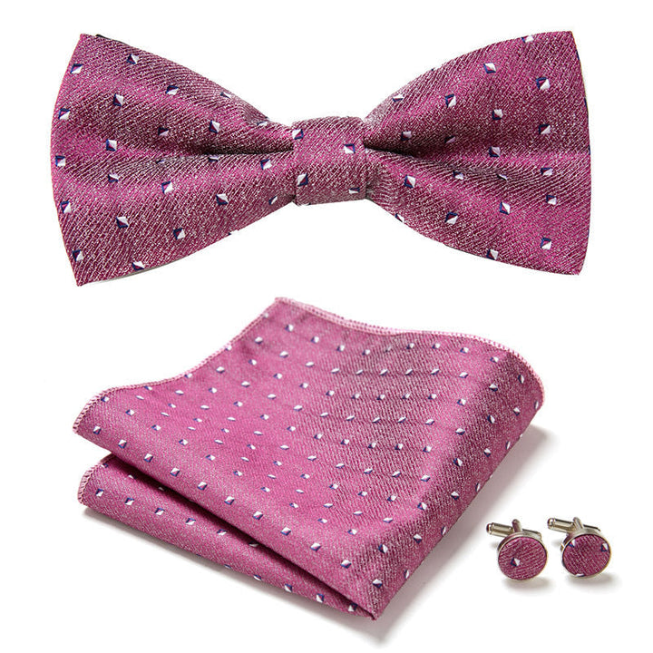 Matchende heren vlinderstrik, pochet en manchetknopen met trendy bloemenprint voor een complete, formele look.
