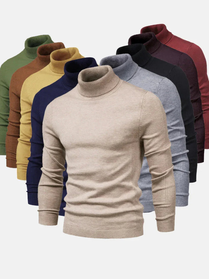 Blauwe heren coltrui, een stijlvolle en elegante trui voor moderne outfits.