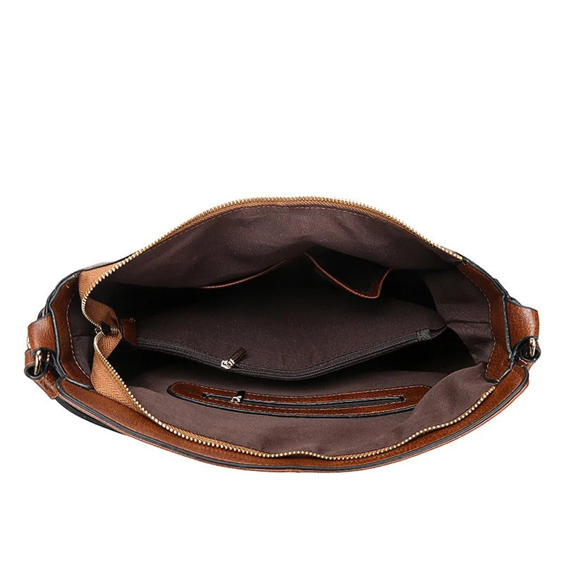 Zwarte luxe dames schoudertas; een elegante, functionele crossbody tas, perfect voor moderne outfits.