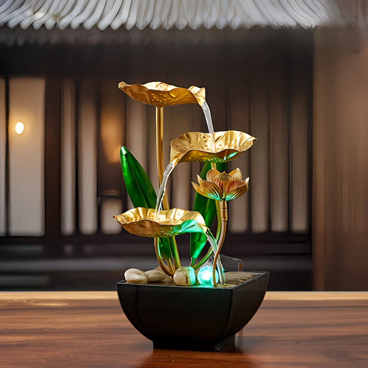 Sfeervolle lotus waterfontein met LED-verlichting, ideaal voor ontspanning en meditatie.