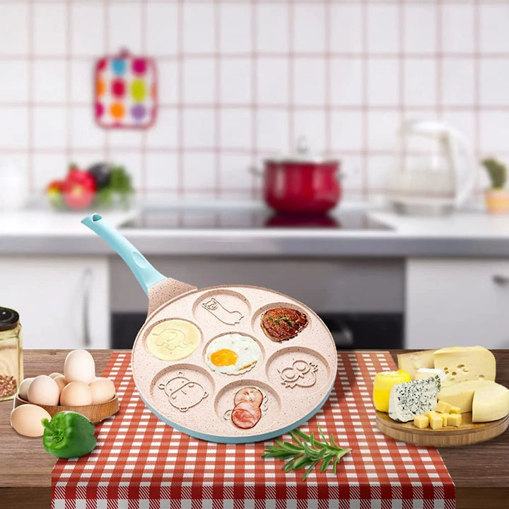 Aluminium pannenkoekenpan voor kinderen met dierenmotieven. De antiaanbaklaag maakt koken makkelijk en veilig.