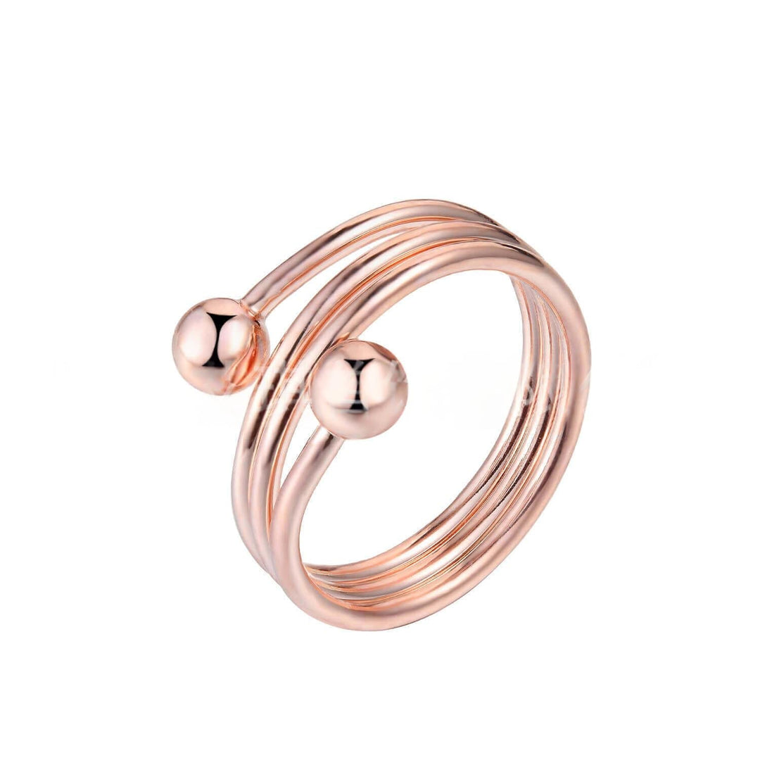 Verstelbare dames koperen ring, bolvormig en galvanisch afgewerkt. Trendy accessoire voor elke outfit.
