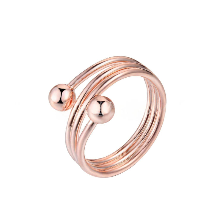 Verstelbare dames koperen ring, bolvormig en galvanisch afgewerkt. Trendy accessoire voor elke outfit.