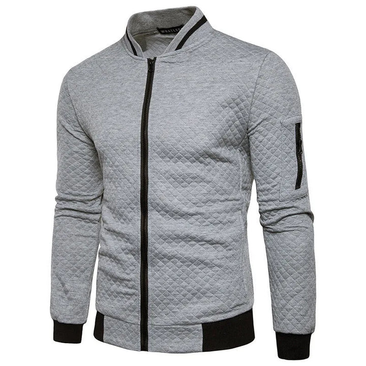 Heren bomberjack, gewatteerd en stijlvol. Dit casual ritsvest met mandarijn kraag is perfect voor moderne mannen.