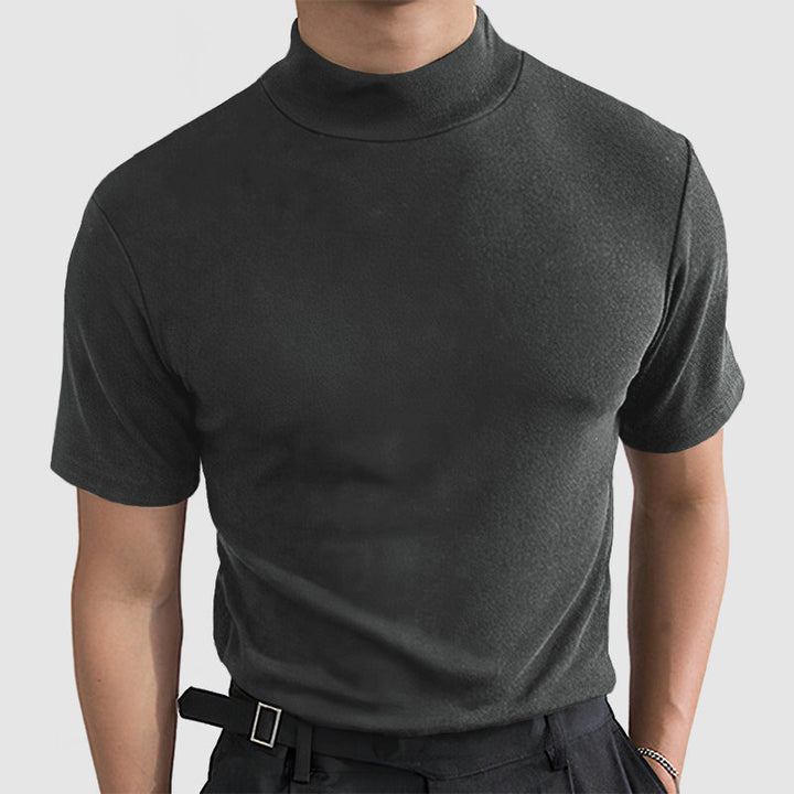 Grijs heren T-shirt, zacht en ademend. Biedt comfort en flexibiliteit, ideaal voor een stijlvolle, casual outfit.