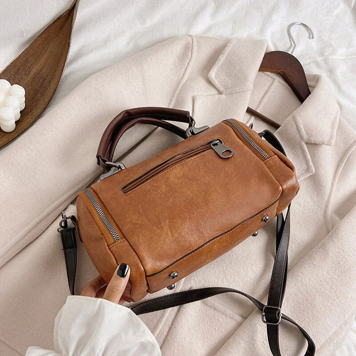 Bruine Boston handtas, klassieke dames schoudertas van PU leer voor diverse outfits.