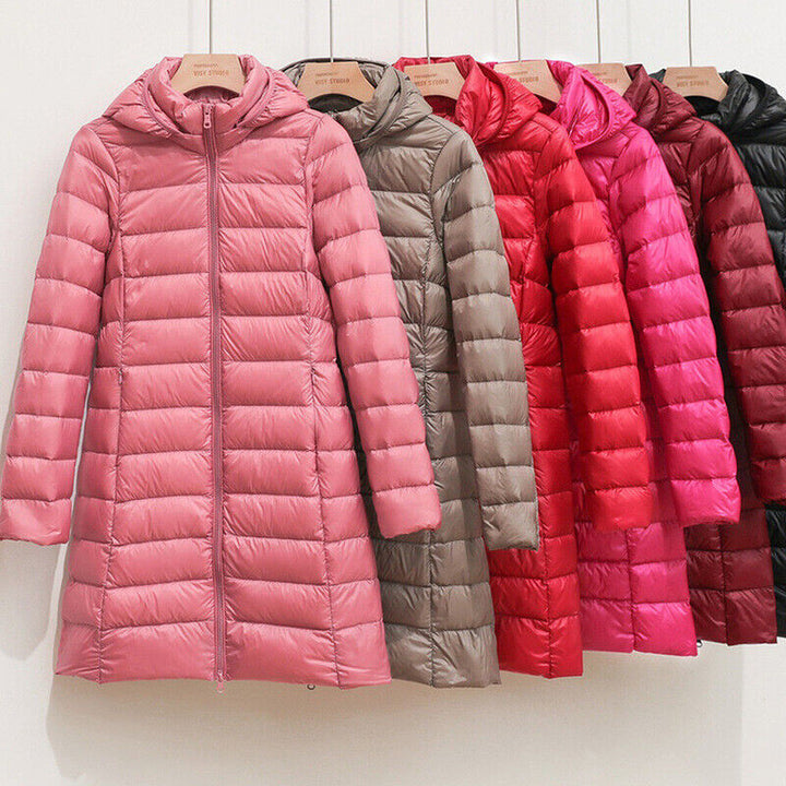 Dames lange winterjas Daisy, warm, stijlvol, gewatteerd en met praktische capuchon.