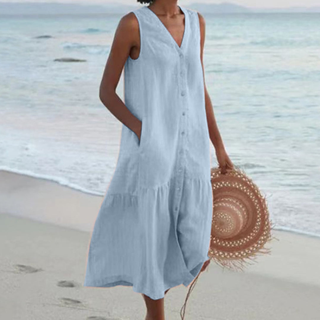 Dames A-lijn midi-jurk met knopen. Elegante zomerjurk met V-hals, mouwloos design. Perfect voor casual gelegenheden.