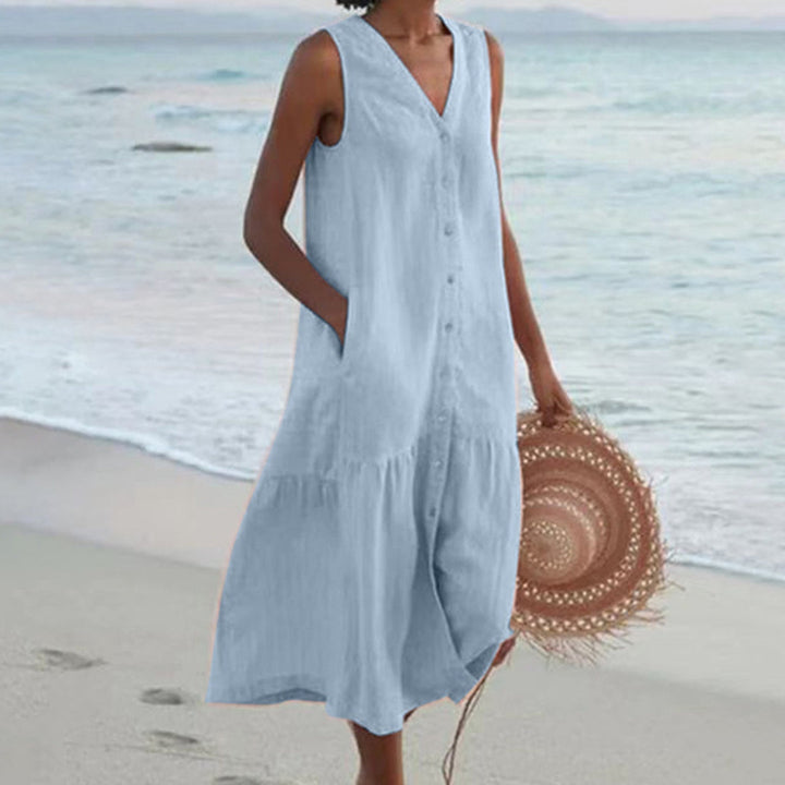 Dames A-lijn midi-jurk met knopen. Elegante zomerjurk met V-hals, mouwloos design. Perfect voor casual gelegenheden.