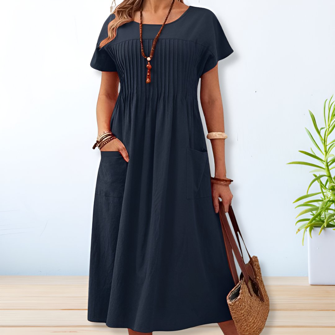 Elegante dames A-lijn midi jurk met korte mouwen en ronde hals, perfect voor zomerse dagen. Comfortabel en veelzijdig.