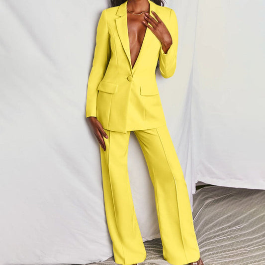 "Dames blazer en broek set in levendige kleuren, elegante snit, perfect voor zakelijke en formele gelegenheden"