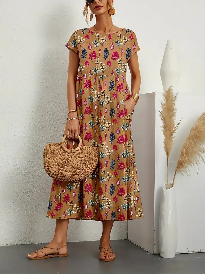 Detail van een elegante dames bloemen A-lijn midi jurk, toont de fijne print en functionele zakken.