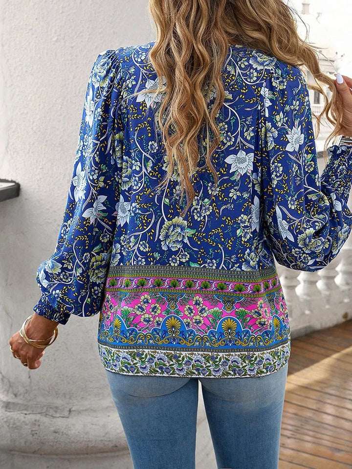Elegante vrouwelijke top: dames bloemenblouse met lange mouwen, perfect voor een chique look.