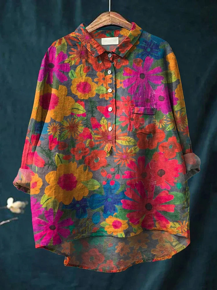 Dames oversized overhemd met lange mouwen, levendige bloemenprint en knoopsluiting, perfect voor zomerse dagen.