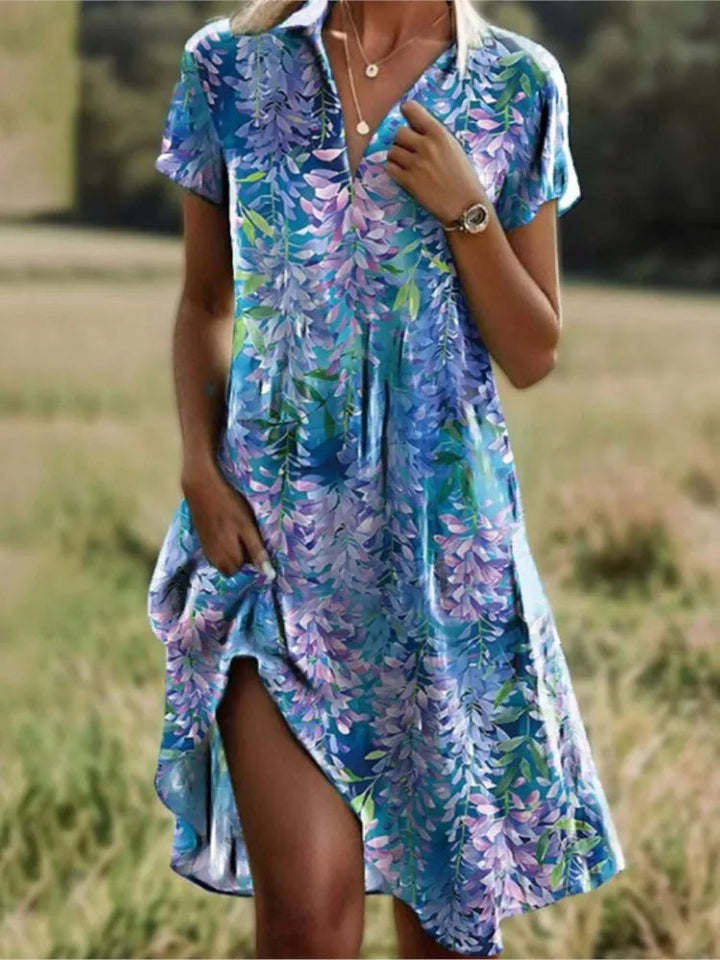 Veelzijdige bloemenjurk voor dames in een mini overhemdjurk model. Comfortabel en stijlvol.