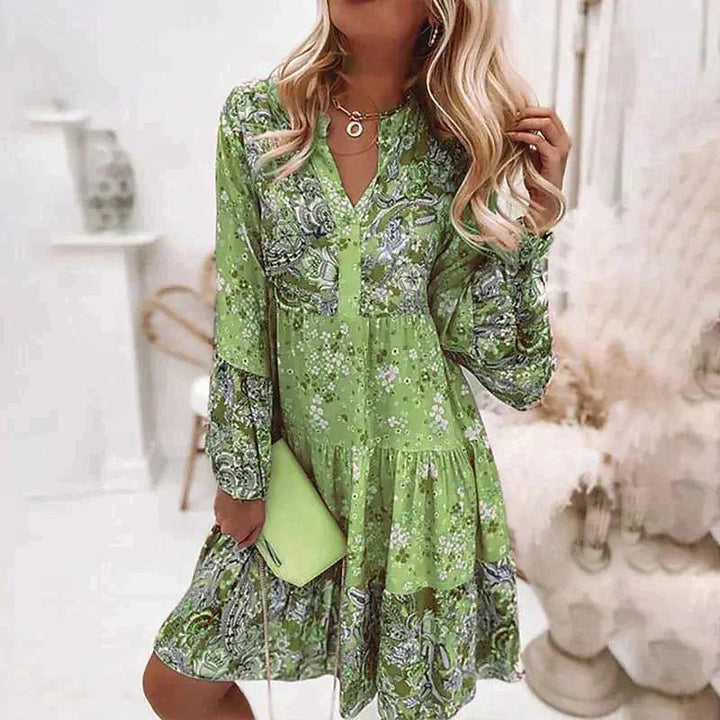Veelzijdige gelaagde dames minijurk met lange mouwen en bloemenprint. Trendy V-hals jurk voor lente/zomer, comfortabel & casual.