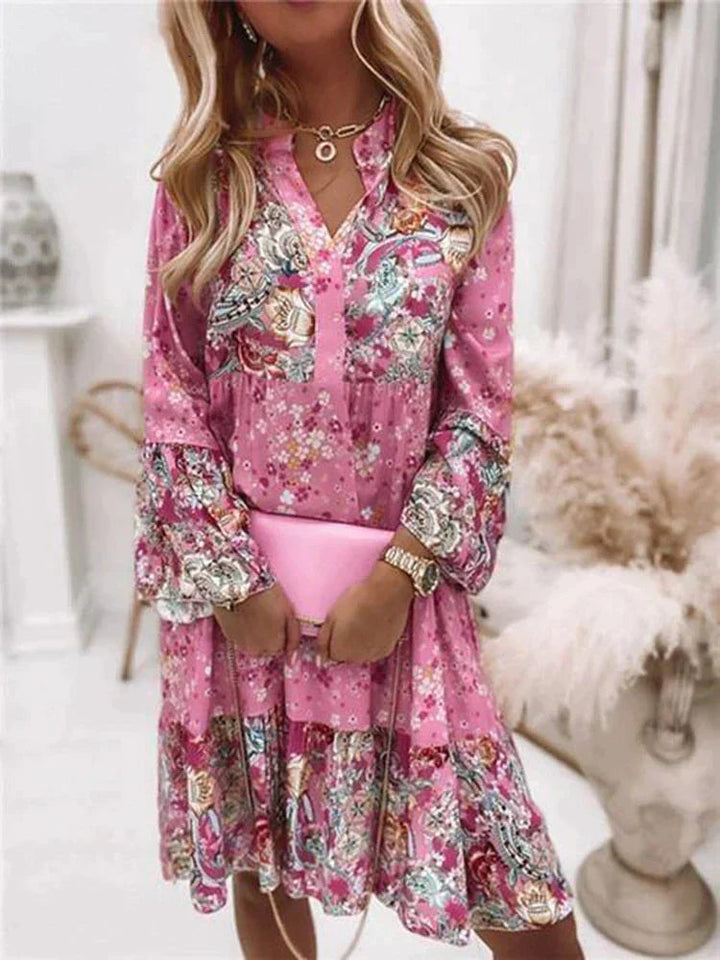 Dames bloemen V-hals minijurk met lange mouwen, perfect voor lente en zomer. Comfortabele casual jurk met trendy bloemenprint.