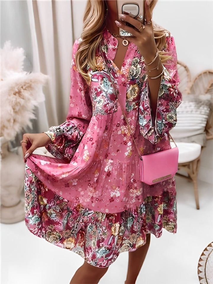 Comfortabele gelaagde minijurk met bloemenprint voor dames. Stijlvolle V-hals lange mouw jurk, perfect voor een casual look.