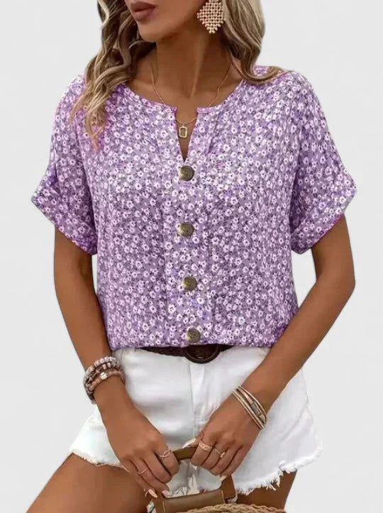 Elegante oversized dames bloemenblouse met korte mouwen. Stijlvolle zomer top met bloemenprint voor comfortabele mode.