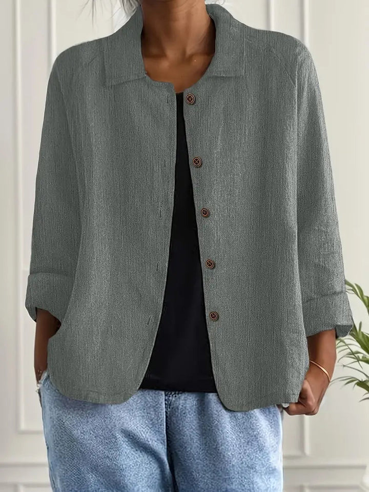 Eigentijdse damesblouse, lange mouw, klassieke kraag, knoopsluiting, voor een moderne look.