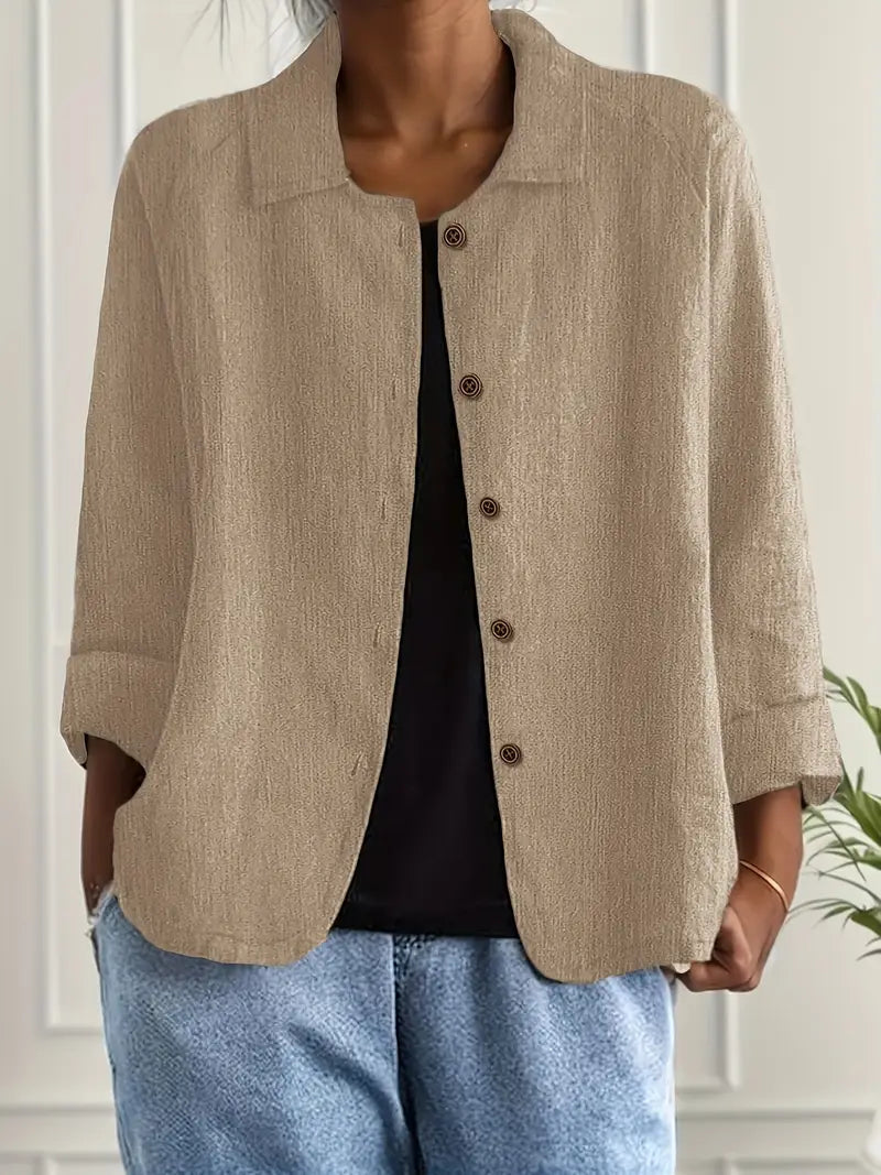 Damesblouse lange mouw, klassieke kraag, knoopsluiting, een essentieel kledingstuk.