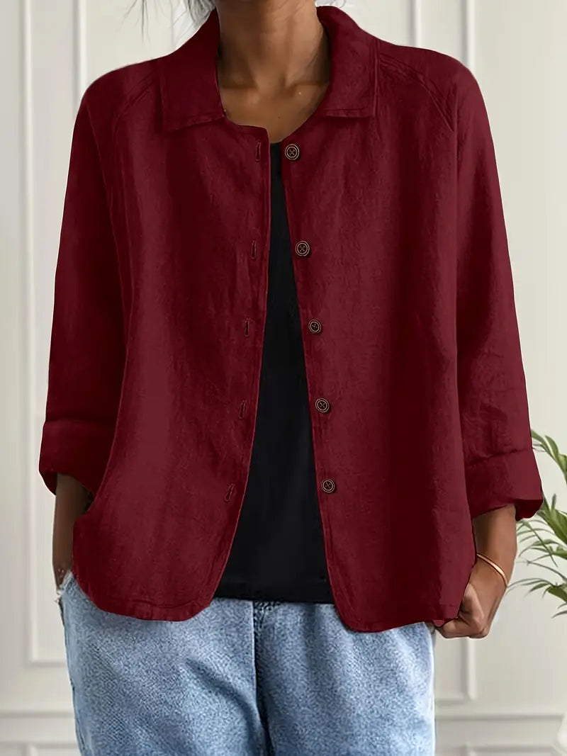 Damesblouse met knoopsluiting, lange mouwen en klassieke kraag, een tijdloze modekeuze.