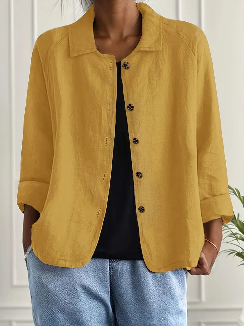 Moderne damesblouse, lange mouw, klassieke kraag, knoopsluiting, chique en veelzijdig.