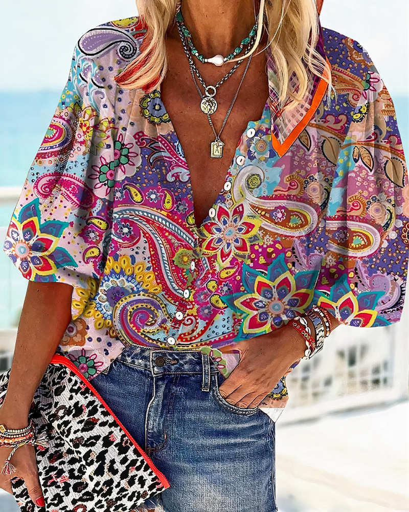 Veelzijdige dames zomerblouse met bloemenprint, V-hals en lange mouw; perfect voor elke gelegenheid.