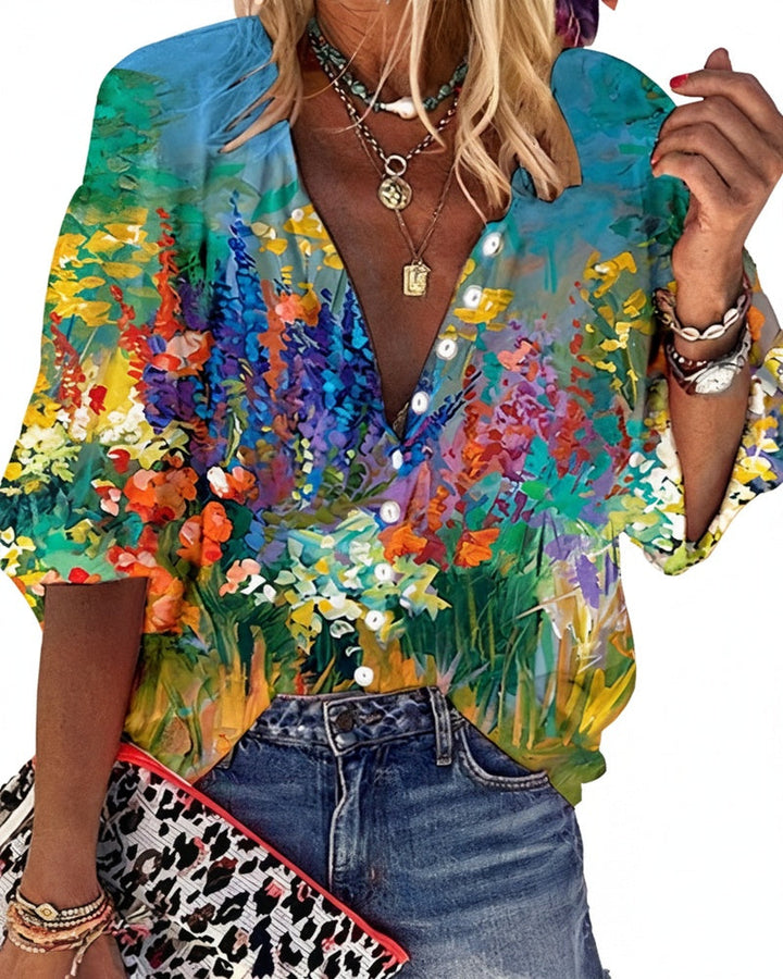 Zomerse dames boho blouse met kleurrijke bloemenprint en elegante V-hals; perfect voor een casual look.