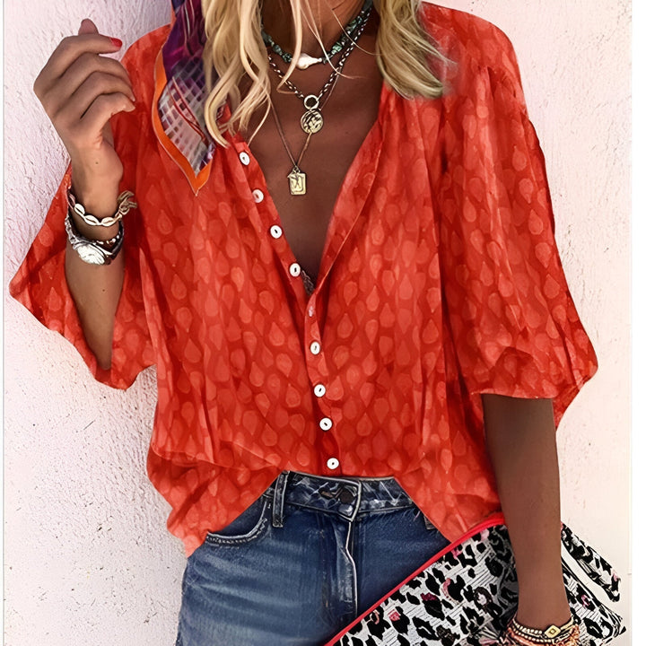 Casual chic dames blouse met knoopsluiting. Deze comfortabele top in losse pasvorm is perfect voor een stijlvolle look.