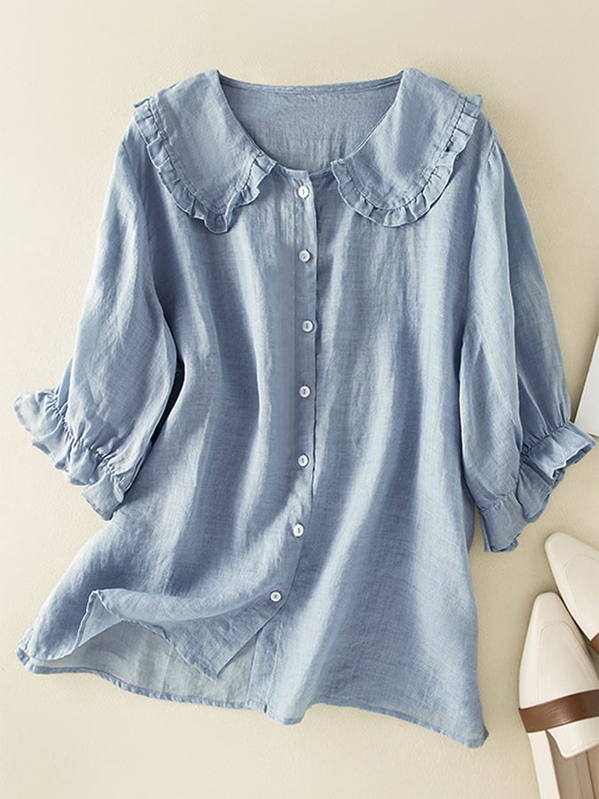 Elegante dames blouse met verfijnde rucheskraag en 3/4 mouw, perfect voor een casual chic zomerlook.