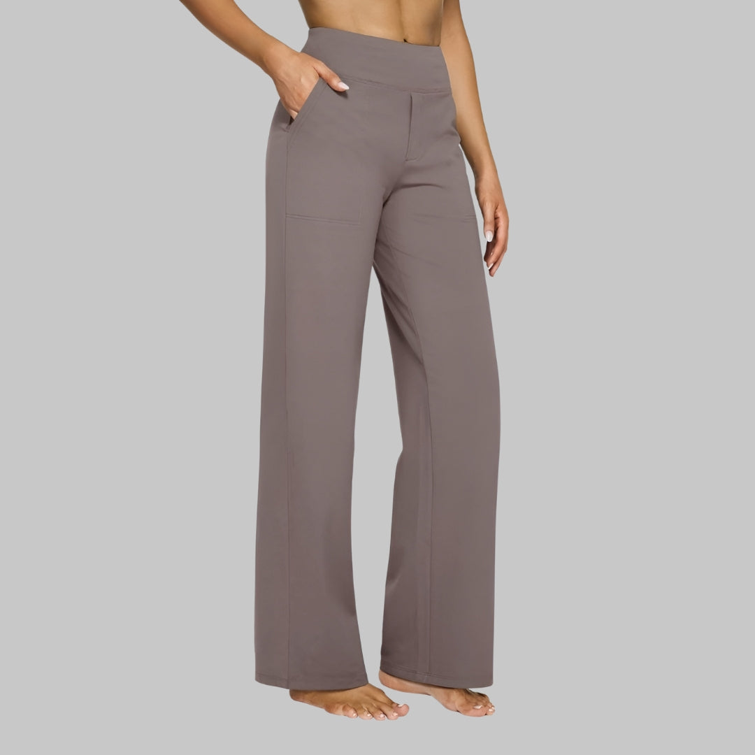 Comfortabele damesbroek: hoge taille, wijde pijpen en elastische band. Perfect voor dagelijks gebruik.