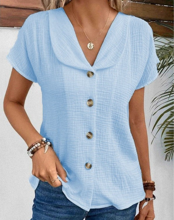 Dames blouse met unieke Peter Pan kraag en knoopsluiting. Casual chique top met korte mouwen voor de zomer.