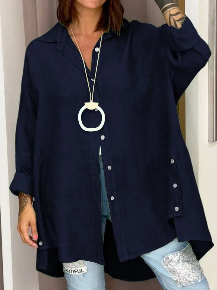 Klassieke witte button-down blouse voor dames met lange mouwen, elegant en veelzijdig voor elke gelegenheid.