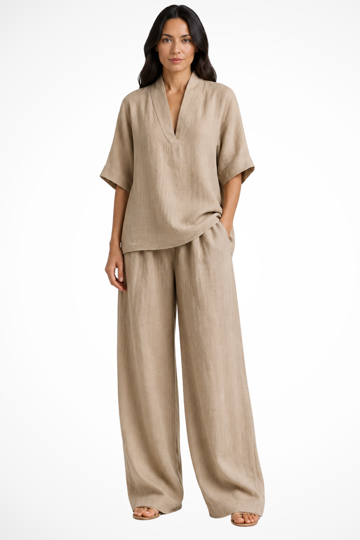 Moderne dames co-ord: oversized V-hals shirt en wide leg pantalon, veelzijdig en comfortabel.