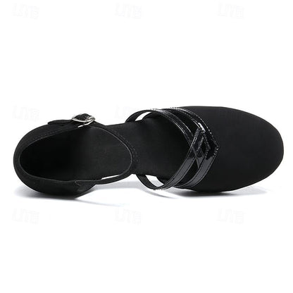 "Dames dansschoenen, comfortabel, flexibel voor moderne dans, elegante lage hak, ronde teen, zwarte afwerking."