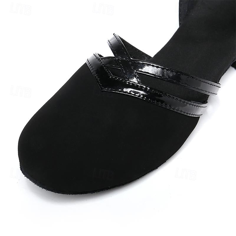 "Dames dansschoenen, comfortabel, flexibel voor moderne dans, elegante lage hak, ronde teen, zwarte afwerking."