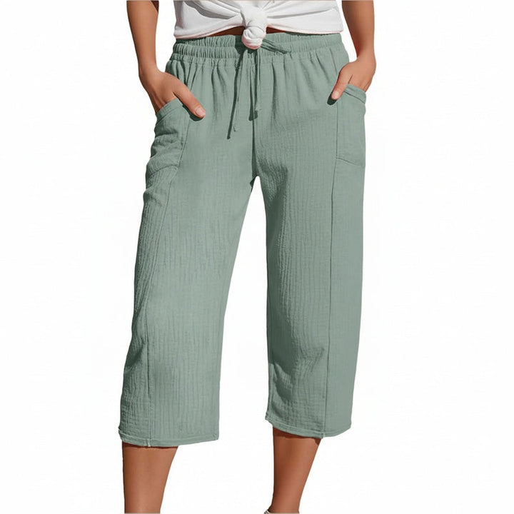 Dames driekwart broek, casual, met elastische taille en handige zijzakken. Perfect voor de zomer.