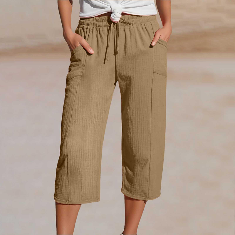 Driekwart dames broek met comfortabele pasvorm, elastische taille en zijzakken. Ideaal voor relaxte dagen.